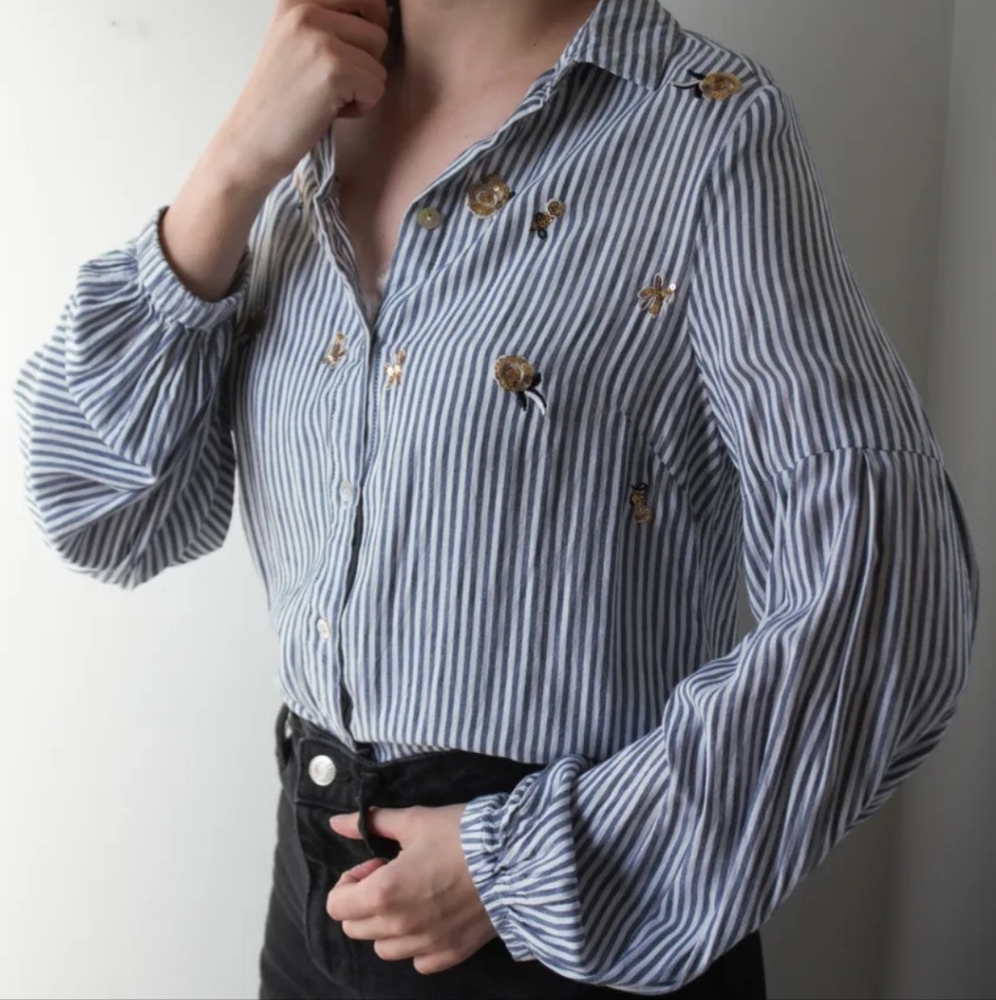 Blouse with sequins details and ball sleeves